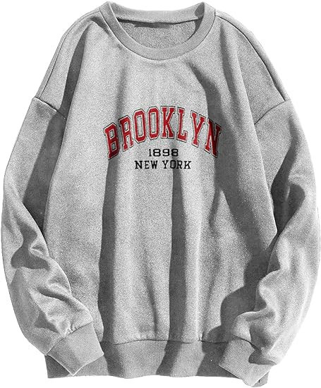 WDIRARA Women's Letter Graphic Print Round Neck Long Sleeve Sweatshirt Tops Pullovers | Amazon (US)