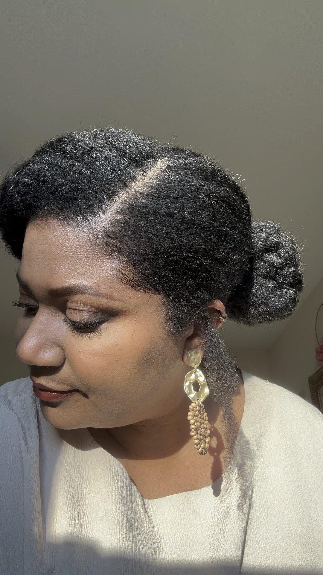 When the sun shines through on your natural hair. ☺️ Relaxer and color free hair . Our hair grows when we show it love ❤️ 
Products I use shown while wearing my natural hair or during protective styles. 
The standing rack or table rack is so helpful when braiding and pre sectioning hair while the 3 way mirror 🪞 is such a God send while parting the back of my head. 
When I want a silk press I use the exact titanium flat iron seen here. 

#LTKSaleAlert #LTKStyleTip #LTKBeauty