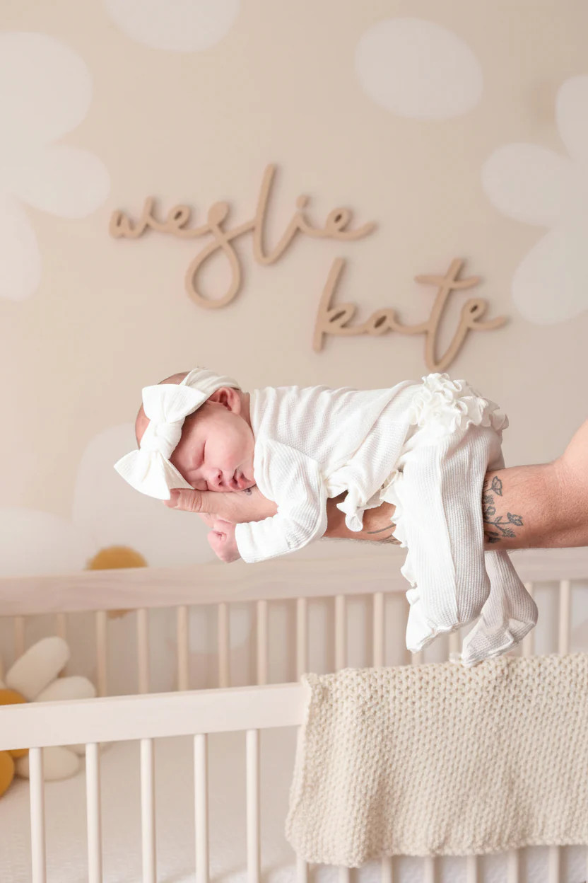 Cloud White Bamboo Waffle Ruffle Zipper Footie | Caden Lane