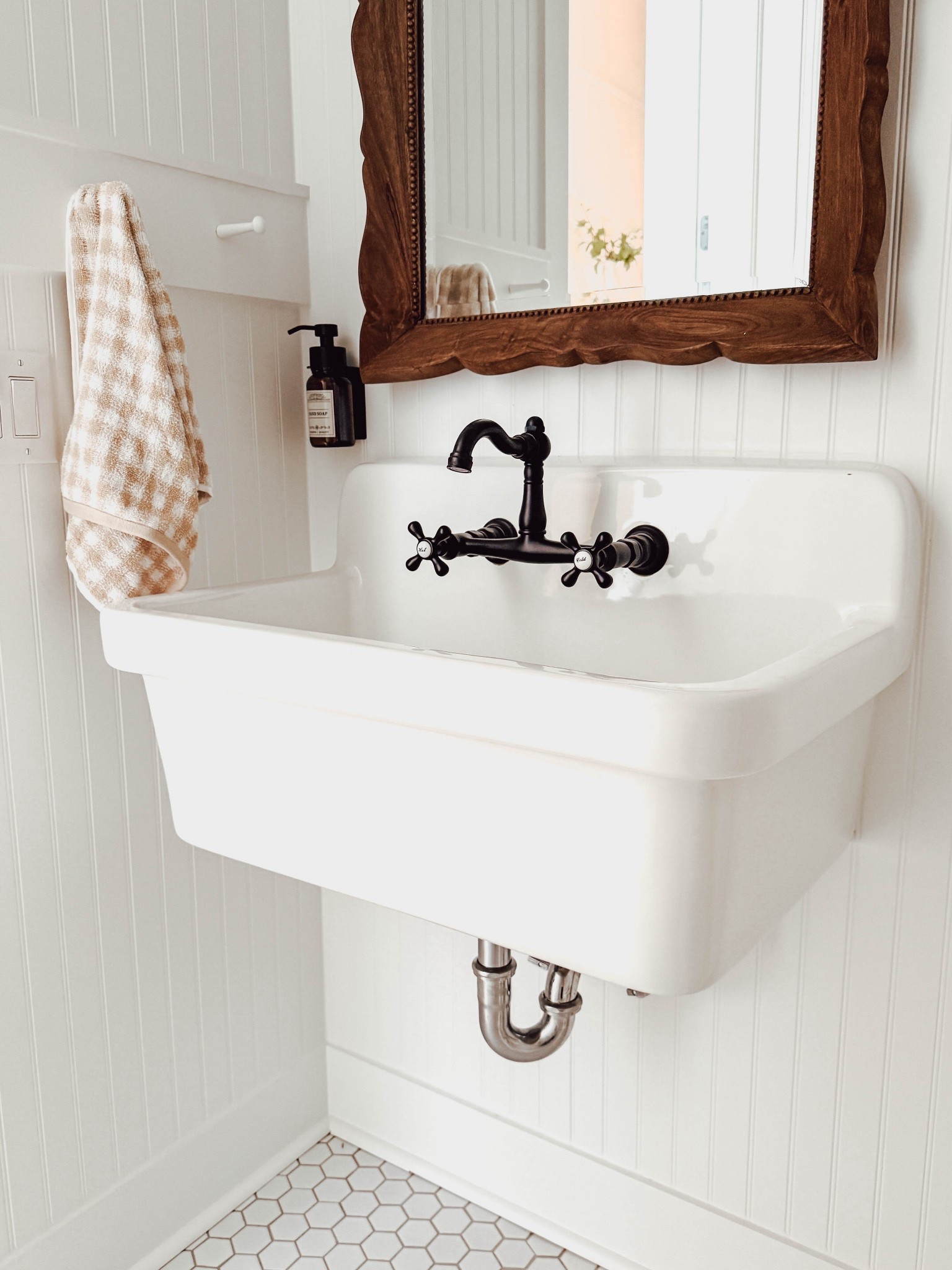 Cottage bathroom with vintage sink and vintage faucet - wood mirror 

#LTKHome