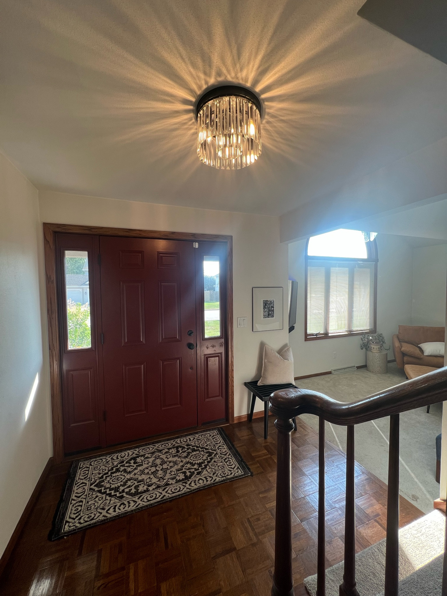 Another house update: we switched out our old light for this statement. More renovations to come in the spot = painting front door, painting trim same color as walls (BM white dove), ripping out all carpet in the house and replacing with hardwood or LVP, still deciding. Stay tuned! 

#LTKstyletip #LTKhome #LTKSale