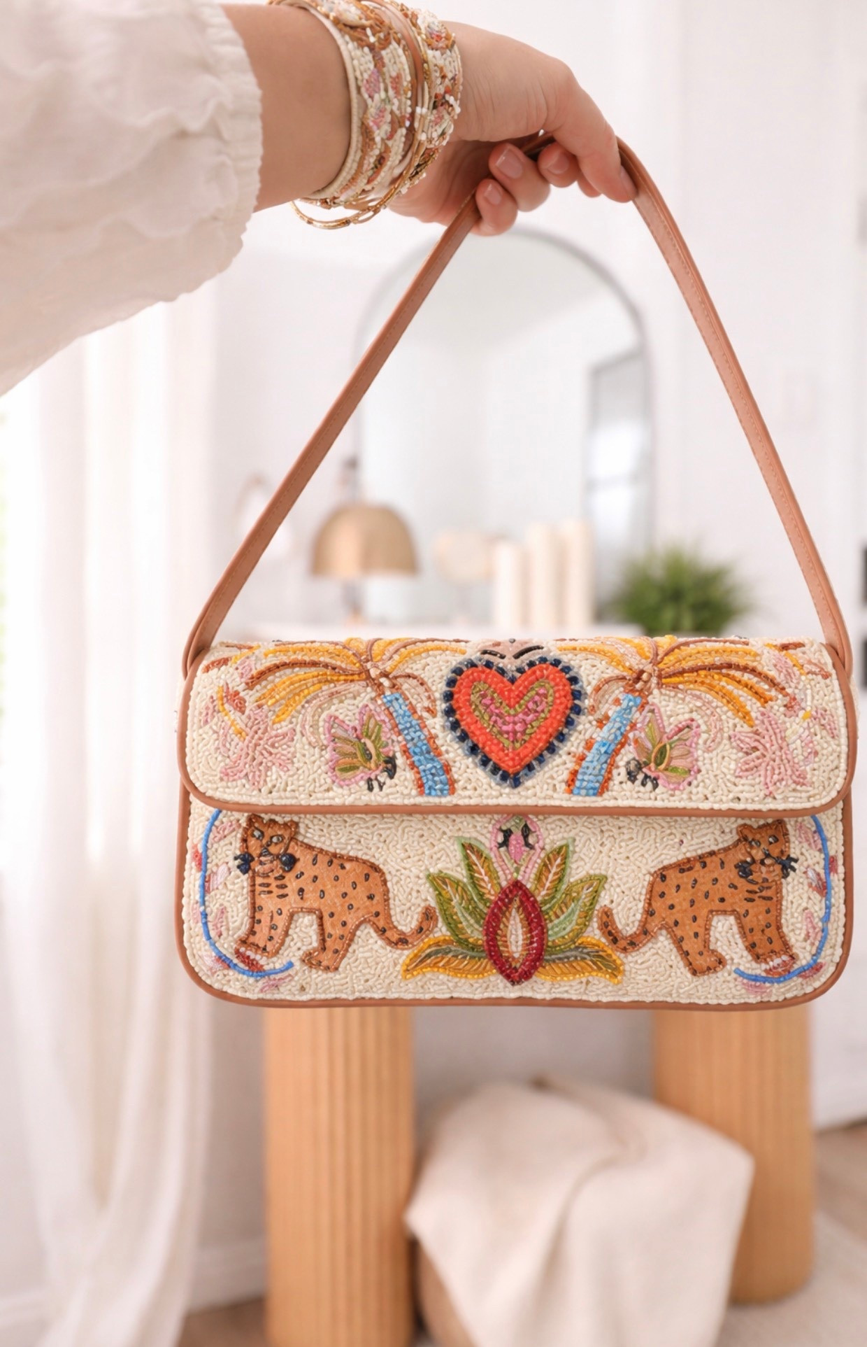 Newest beaded bag from @amerciaandbeyond linking similar since this brand isn’t on LTK! 

#LTKTravel #LTKootd #LTKSaleAlert