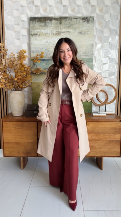 Fall workwear at its best — a classic double-breasted tan trench coat layered over a soft taupe V-neck sweater. A polished office outfit that transitions straight to dinner. Sizing: sweater tts, L, pants tts wearing XL but need L, jacket tts, L

#LTKWorkwear #LTKMidsize #LTKOver40