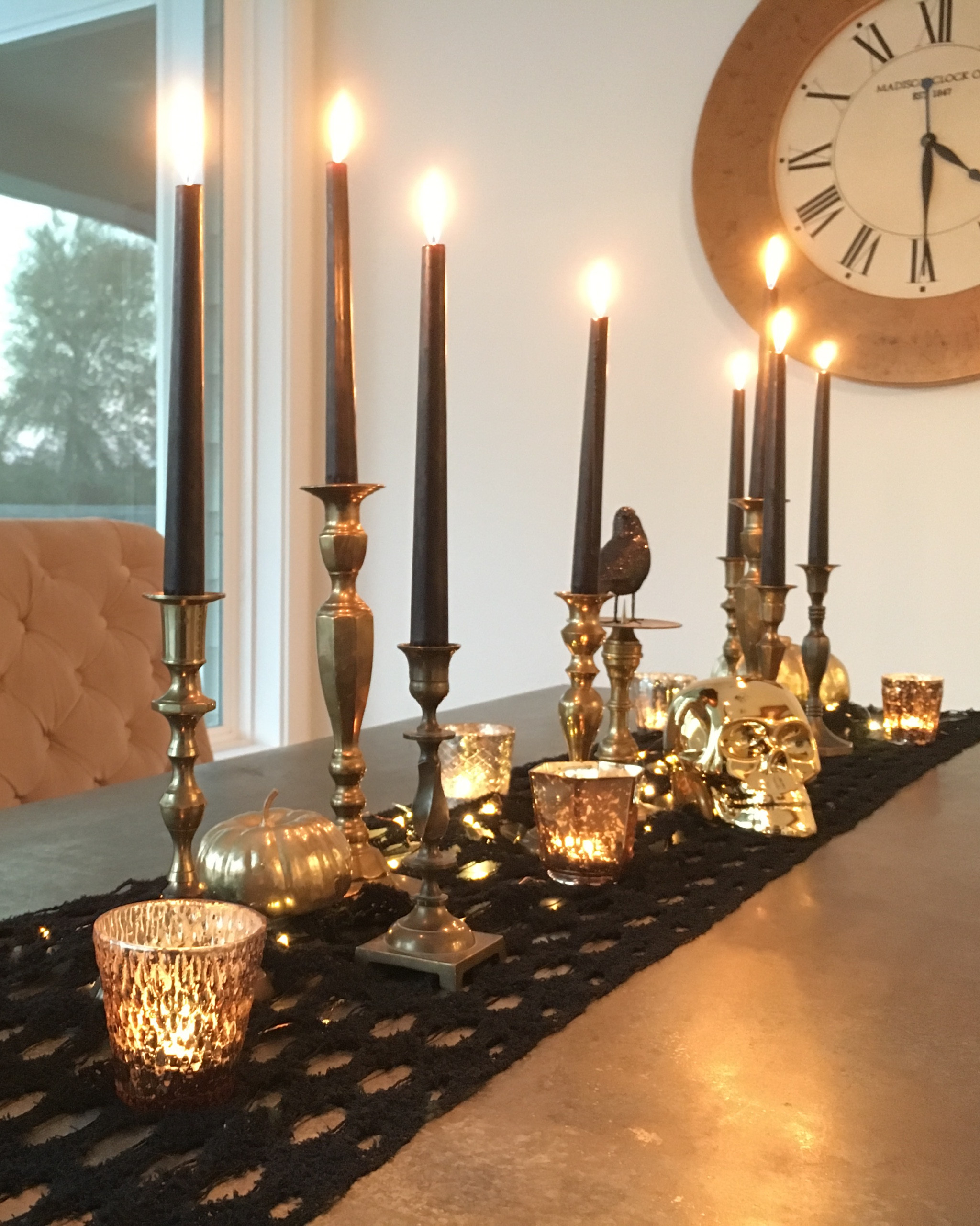 Halloween table decor party tablescape black candle taper candle sticks gold brass candle holder candlesticks gold skull black crow votives 

#LTKparties #LTKhome #LTKHalloween