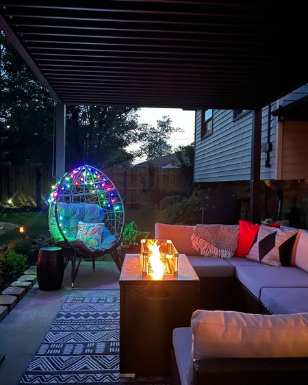 More views from the patio! - egg chair with colorful string lights - outdoor sectional sofa with fire pit - outdoor rug (than can be used indoors) - outdoor throw pillows - aluminum pergola with Louvres boight from Wayfair but also found on Amazon - Amazon Home - Amazon finds - pergola - patio decor - patio vibes 

#LTKunder100 #LTKSeasonal #LTKhome