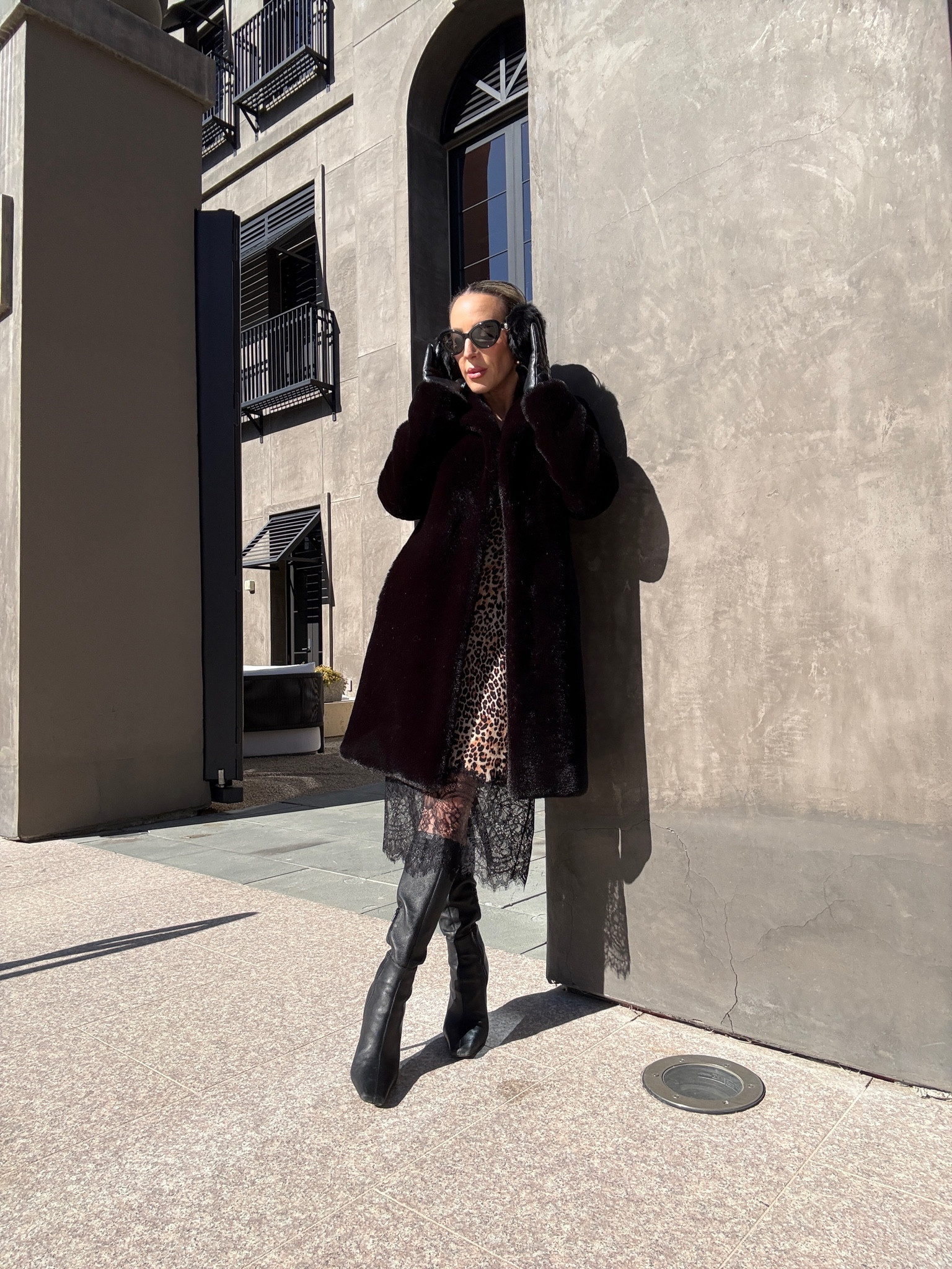 Winter to spring outfit ideas: layer a leopard print slip dress over a polo neck bodysuit and under a long black faux fur coat, add tights, black knee high boots, and black faux fur earmuffs depending on how cold it is. 

#LTKSeasonal #LTKShoeCrush #LTKStyleTip