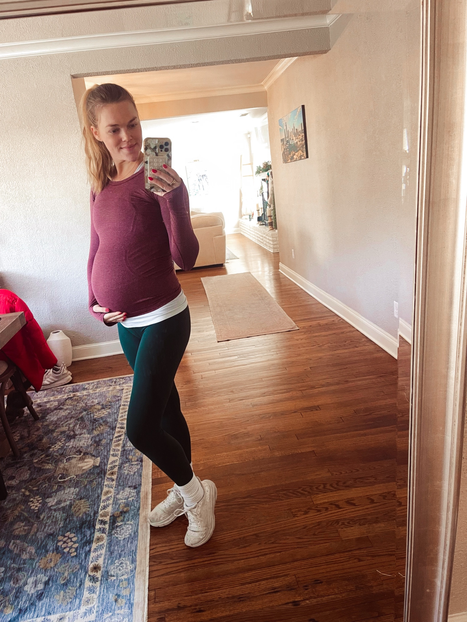 Nothing like super stretchy workout clothes in your third trimester. Lululemon has come through clutch. Christmas workout look. Bump fit. Burgundy long sleeve. Green align leggings. White tank top. White Hokas  

#LTKBump #LTKActive #LTKHoliday
