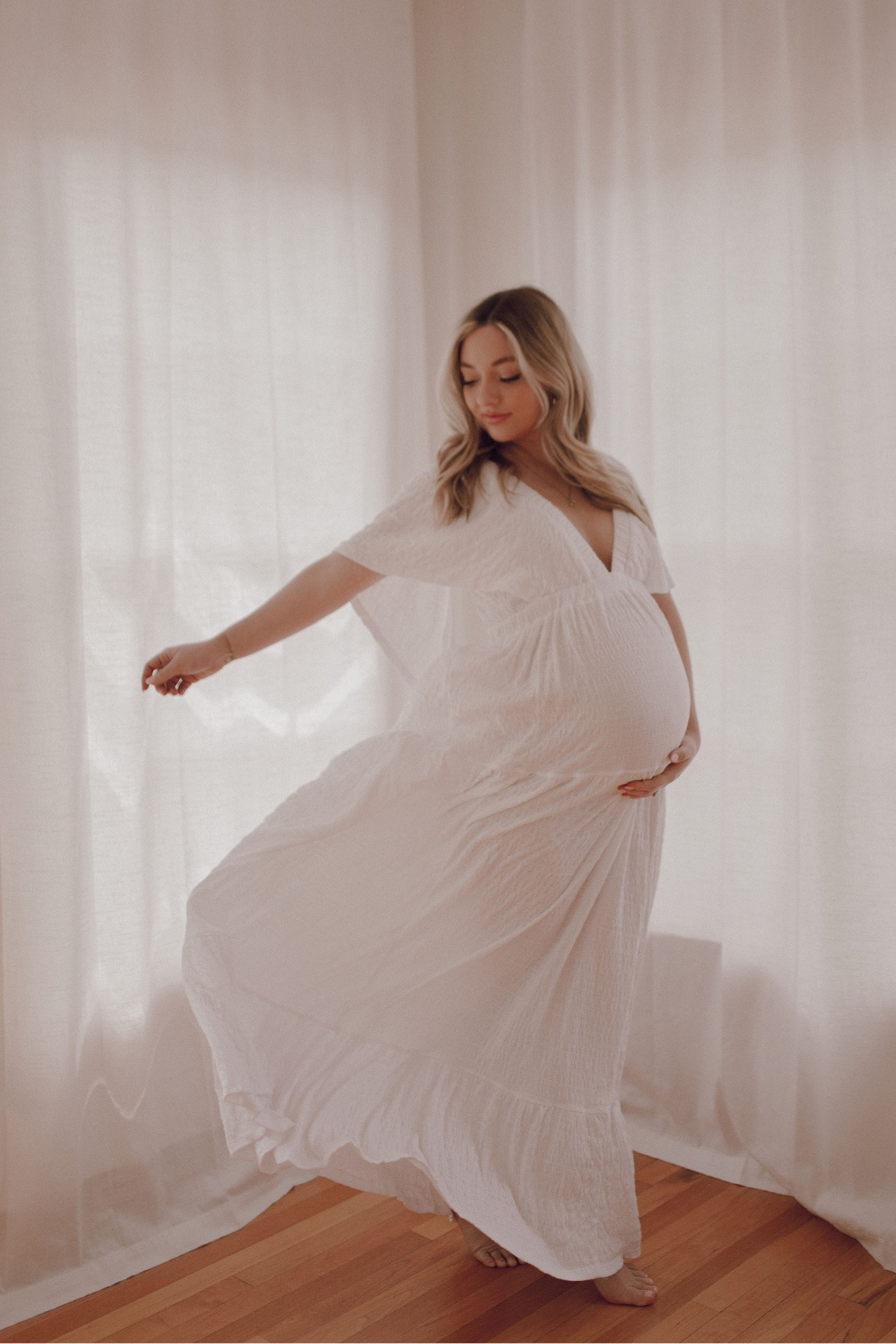 Free People dress I wore for our maternity shoot 🤍
