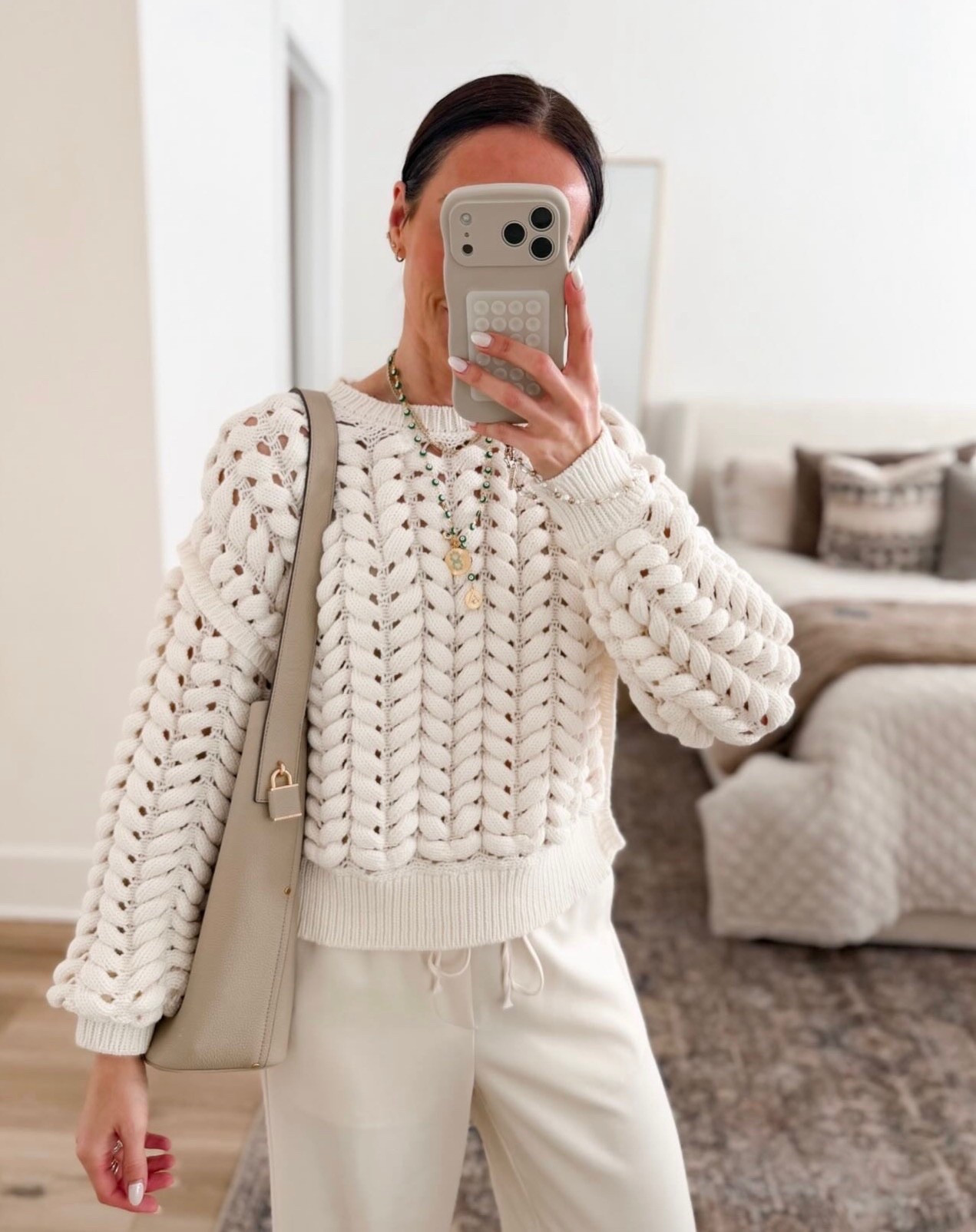 This neutral look is the definition of effortless chic, the textured knit adds the perfect amount of detail while still feeling elevated and easy to wear. Paired with relaxed trousers and simple accessories, it’s one of those outfits that looks polished without trying too hard.

neutral outfit, textured sweater, ivory outfit, monochrome style, elevated basics, chic everyday outfit, cozy chic style, spring neutrals, effortless outfit, annabrstyle

#LTKOver40 #LTKootd #LTKSeasonal