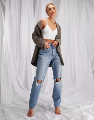 ASOS DESIGN high rise slouchy mom jeans in stone wash with rips | ASOS (Global)