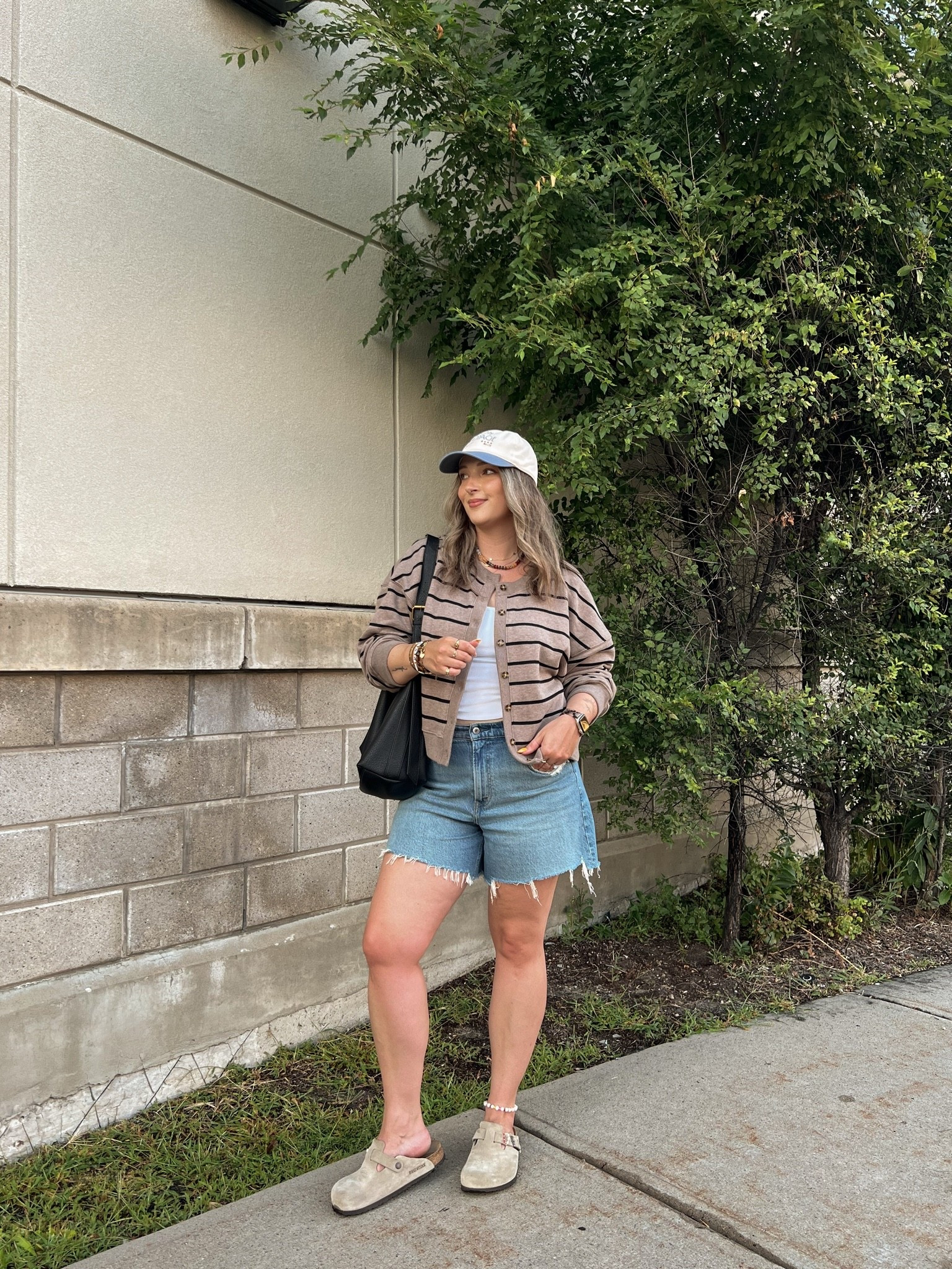 Abercrombie summer to fall transitional outfit! Wearing size L in the striped cardigan sweatshirt and size M in the bra free tank. Sized up to 32 in the denim shorts for a baggy fit. I’m a 9.5-10 shoe and wear a 40 in the Birkenstocks

#LTKfall #LTKsale #LTKmidsize