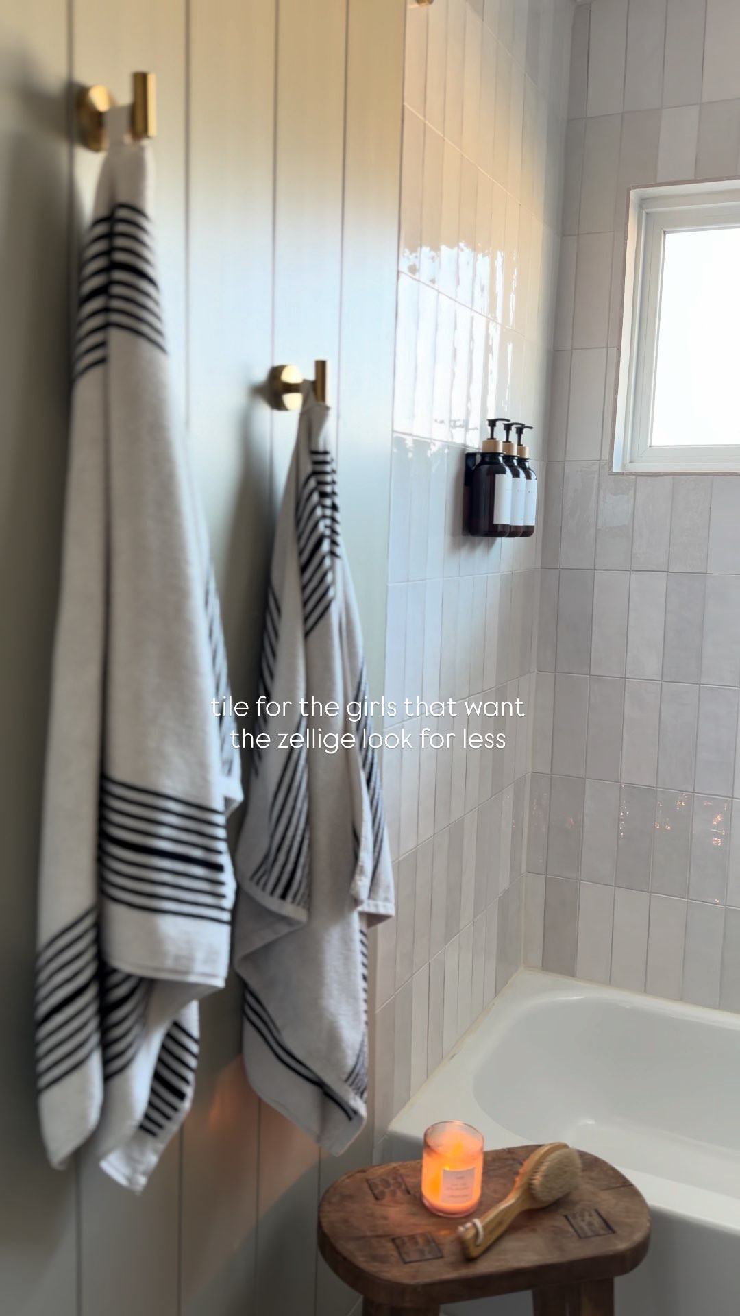 This Lowes tile is the perfect zellige look for less! Linking all of our other guest bath pieces too!

bathroom decor, penny tile, gold fixtures, shower curtain, Kohler toilet, wood vanity 

 #LTKHome