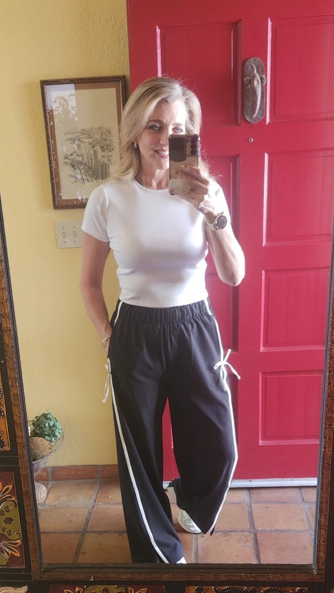 These pants have been a best seller. They also come in red and track pants are trending this spring. I sized down because they are a little over sized. 






Track pants, athleisure, womens clothing, trending, viral, best seller, black, white, casual looks. Casual outfits, spring looks, transition pieces, travel look, pants, comfy. Loungewear,

#LTKfindsunder50 #LTKstyletip #LTKActive