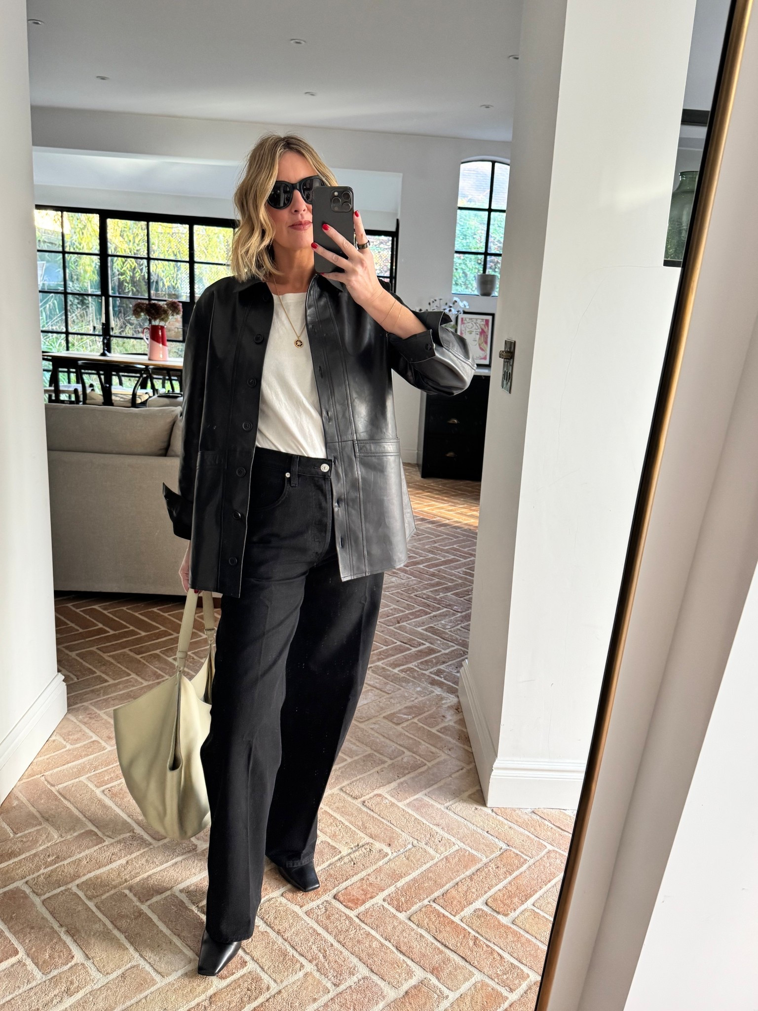 Sezane Leather Shirt + Black Jeans 

#LTKuk #LTKeurope #LTKdatenight