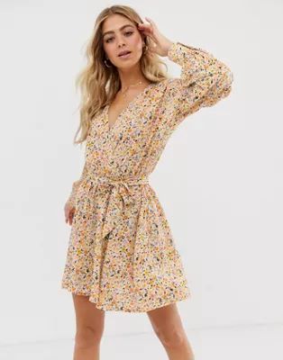 ASOS DESIGN mini wrap front dress with statement sleeve in ditsy print | ASOS US