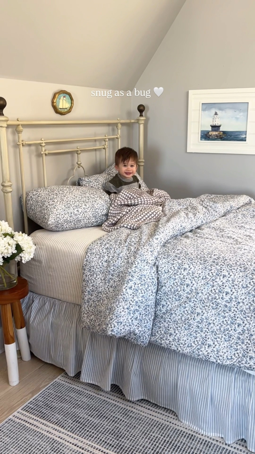 The snug - Blue floral bedding, linen oatmeal striped sheets, knit blanket, small wood stool (I have several of these around the house, so handy and cute!), similar metal beds and coastal art

#LTKSaleAlert #LTKHome #LTKdayinmylife