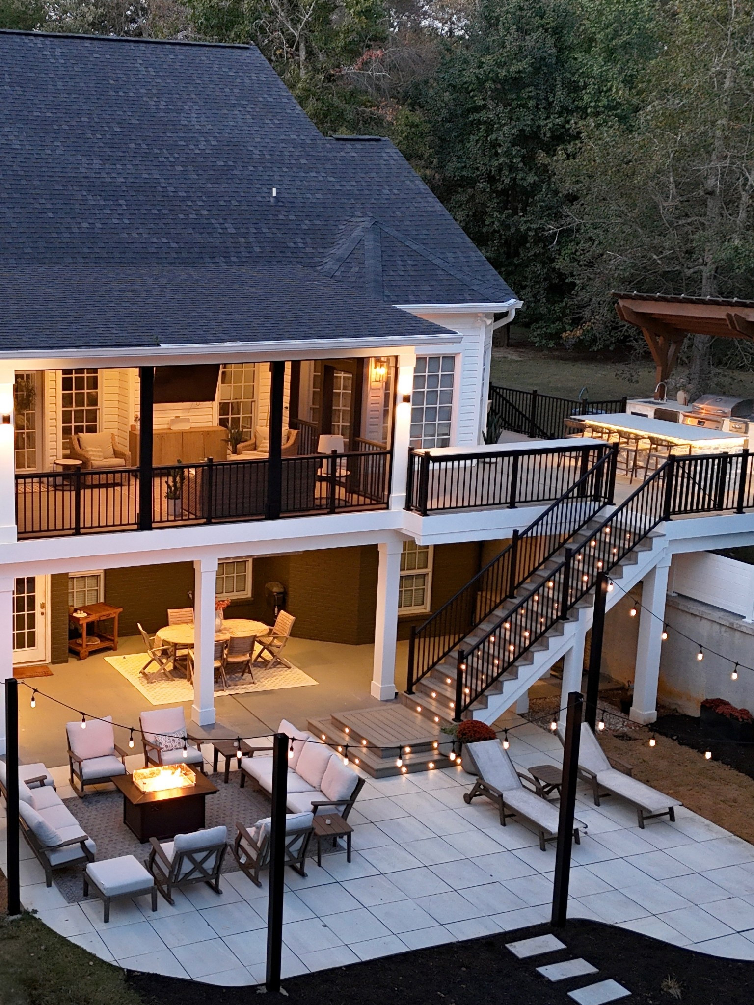 I love the layout of our backyard and how it creates multiple spaces to gather and relax. From the outdoor kitchen and bar area to the patio seating, every spot feels inviting when we host family and friends. This view is my favorite—it perfectly captures the outdoor living and entertaining space we envisioned for our backyard.

#LTKhome #LTKoutdoor #LTKbackyard #BackyardDesign #OutdoorLiving #PatioDesign #OutdoorEntertaining #BackyardInspiration #OutdoorSpace #HomeStyle #lowes #walmart #polywood