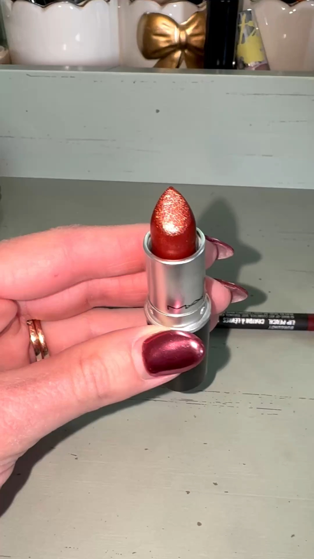 MAC Fresh Moroccan lipstick paired with a deep burgundy liner.

Brick red with a soft gold metallic shift. Such a pretty spring lip option. 🌸

#LTKmorningroutine #LTKBeauty #LTKgrwm