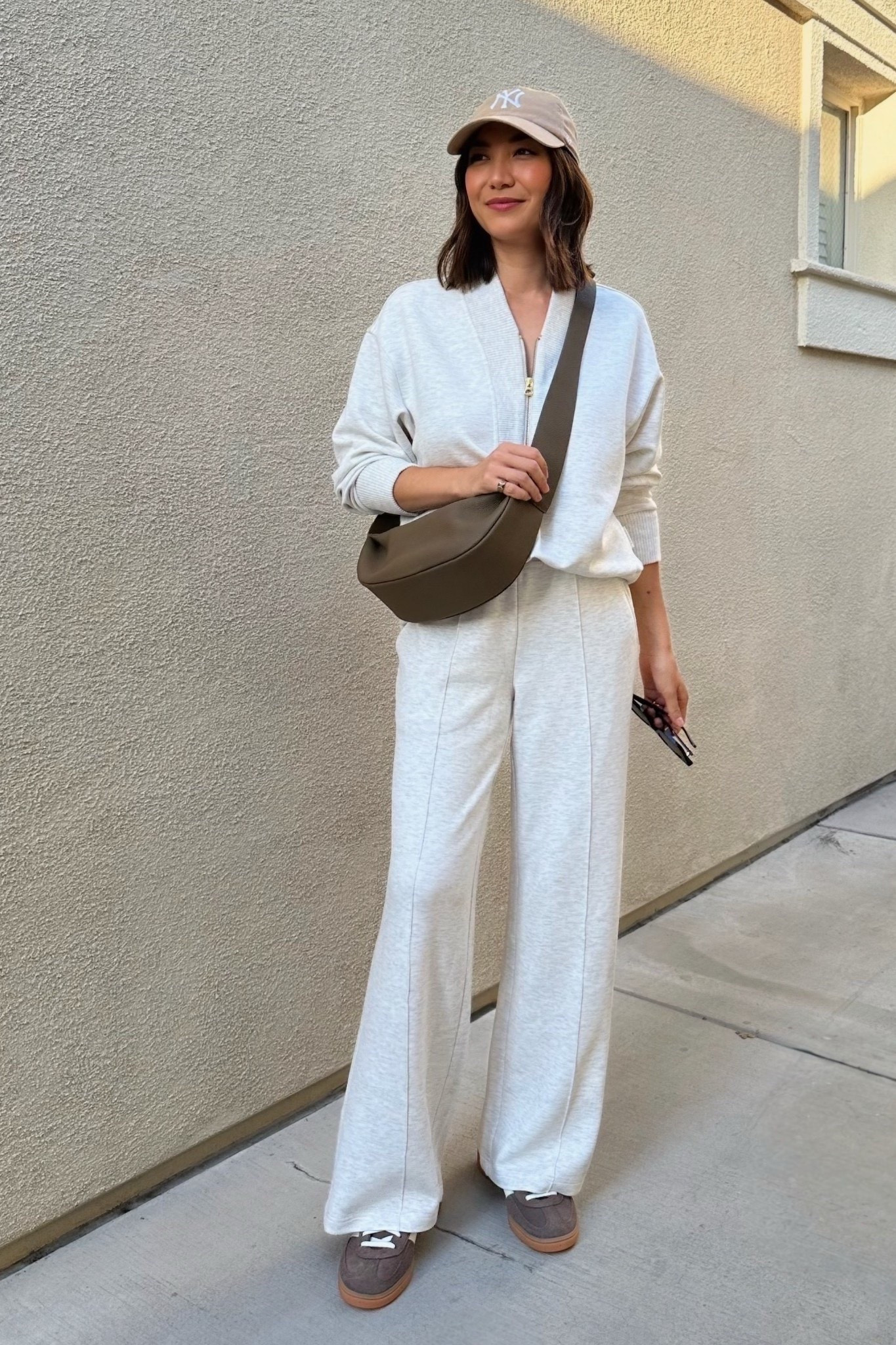 Luxe comfy matching set 

Varley sweatshirt small — linked to a similar style at old navy 
Wide leg pants xs 
Adidas tts 
Amazon crossbody - color is elephant gray, but I think taupe would also be a similar color to match my adidas 


#LTKSeasonal