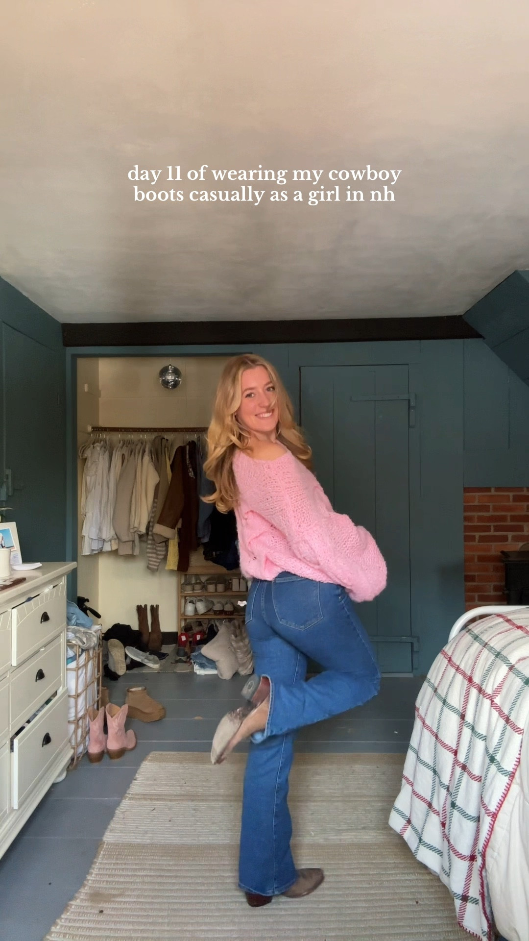 pink sweater bootcut jeans cowboy boot outfit
