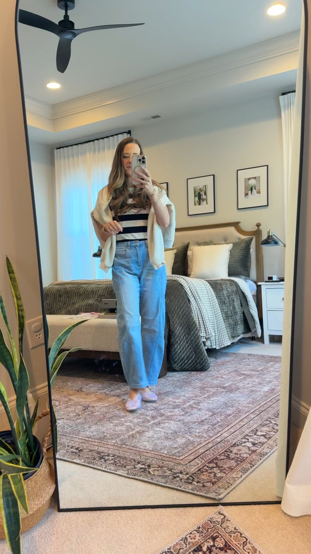I’m normally not one for trends, but the clear jelly flats were too cute to pass up 🤍 Styled them with this navy and cream striped top and my Amazon barrel jeans for an easy casual mom outfit that still feels fun and current. Added a lightweight sweater over the shoulders for a little polish.

#LTKmomlife #LTKootd #LTKSeasonal