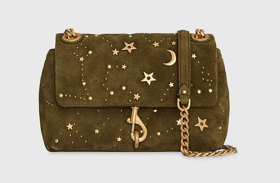 Edie Crossbody With Celestial Studs

The Edie Crossbody can handle whatever your day brings. Crafted in premium leather topped with beautiful celestial studs, a chain link strap and dog clip, this will chic-ly keep your necessities organized

#LTKWorkwear #LTKTravel #LTKGiftGuide