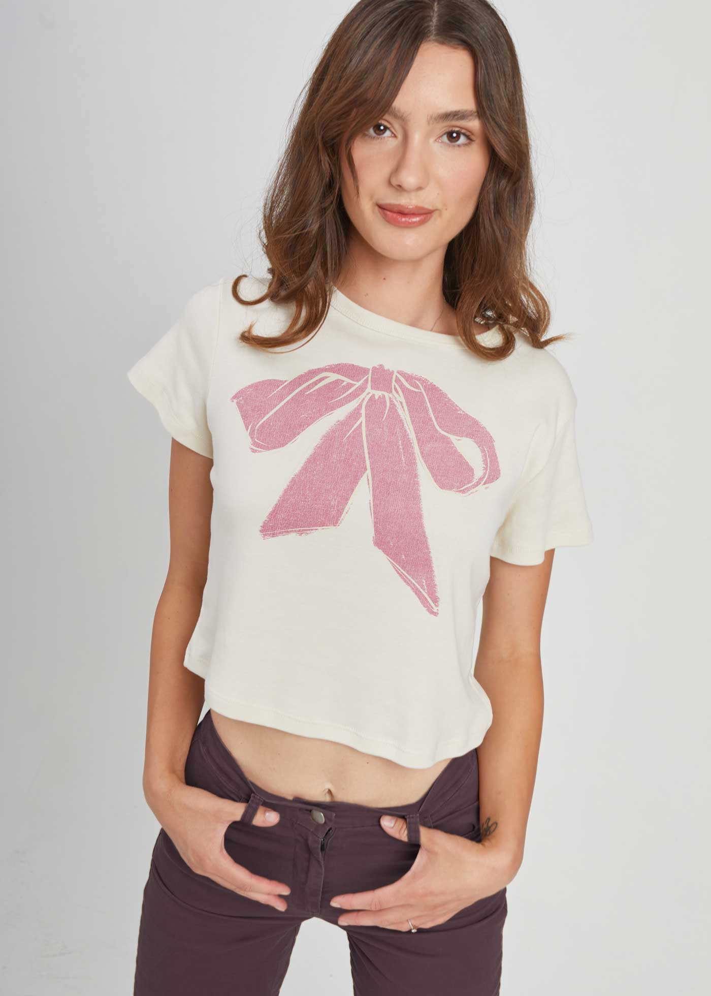 GirlDangerous: Pink Bow Off White Baby Tee | Girl Dangerous