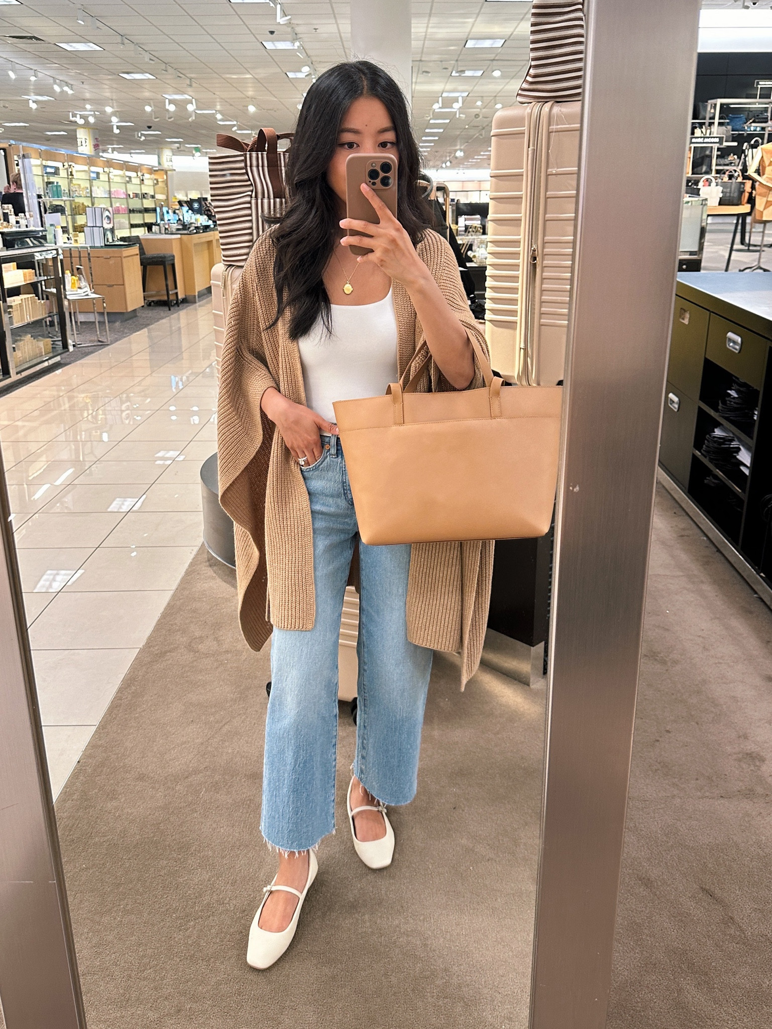 A classic piece from the Nordstrom Anniversary sale 

If you’re looking for an everyday work tote that fits a laptop without overwhelming in size for petites- this seems like a great option in 2 beautiful colors! 

Roomy but not too large, with a magnetic inner closer and two handle straps for wearing over your shoulder or carrying by hand. 

Convenient outer pocket to slip in your phone , smaller inner pocket too 

Also trying on the Allsaints wrap which I unfortunately found to be too big and long for me. Medium weight rib knit.

#LTKxNSale

#LTKworkwear #LTKsalealert #LTKitbag