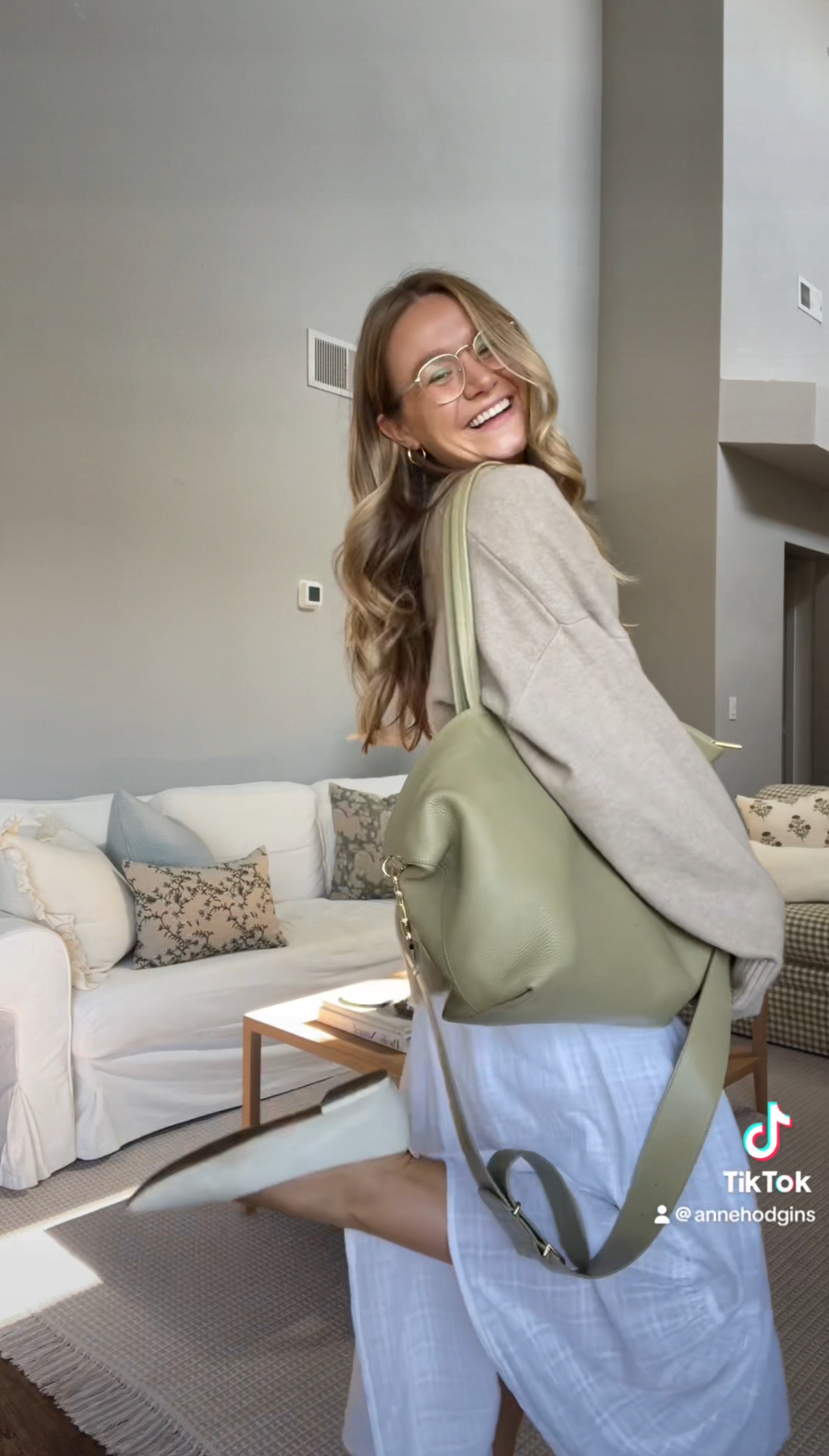 Sweater is Glassons, wearing large. Dress is Jcrew, wearing small. Shoes are Franco Sarto. Glasses are Eyebuydirect. Bag is Cuyana