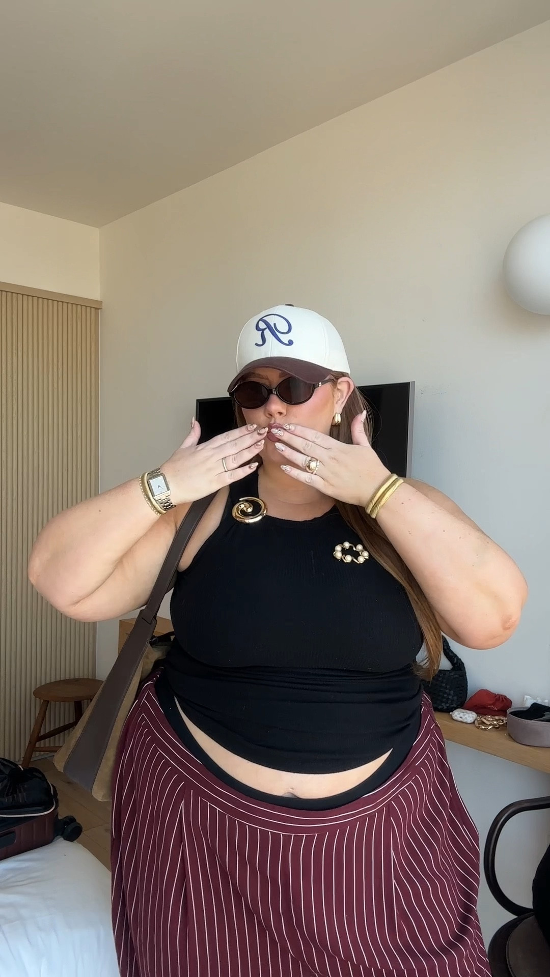 Plus size street style New York City outfit! 

Wearing a size 24 in these ASOS burgundy stripped trousers (should have ordered a 22). They’re super light with a stretch waistband. 

My new addiction will be pair brooches on everything basic top! Such an easy way to elevate an outfit. 

#FashionMonth #LTKautumn #LTKplussize