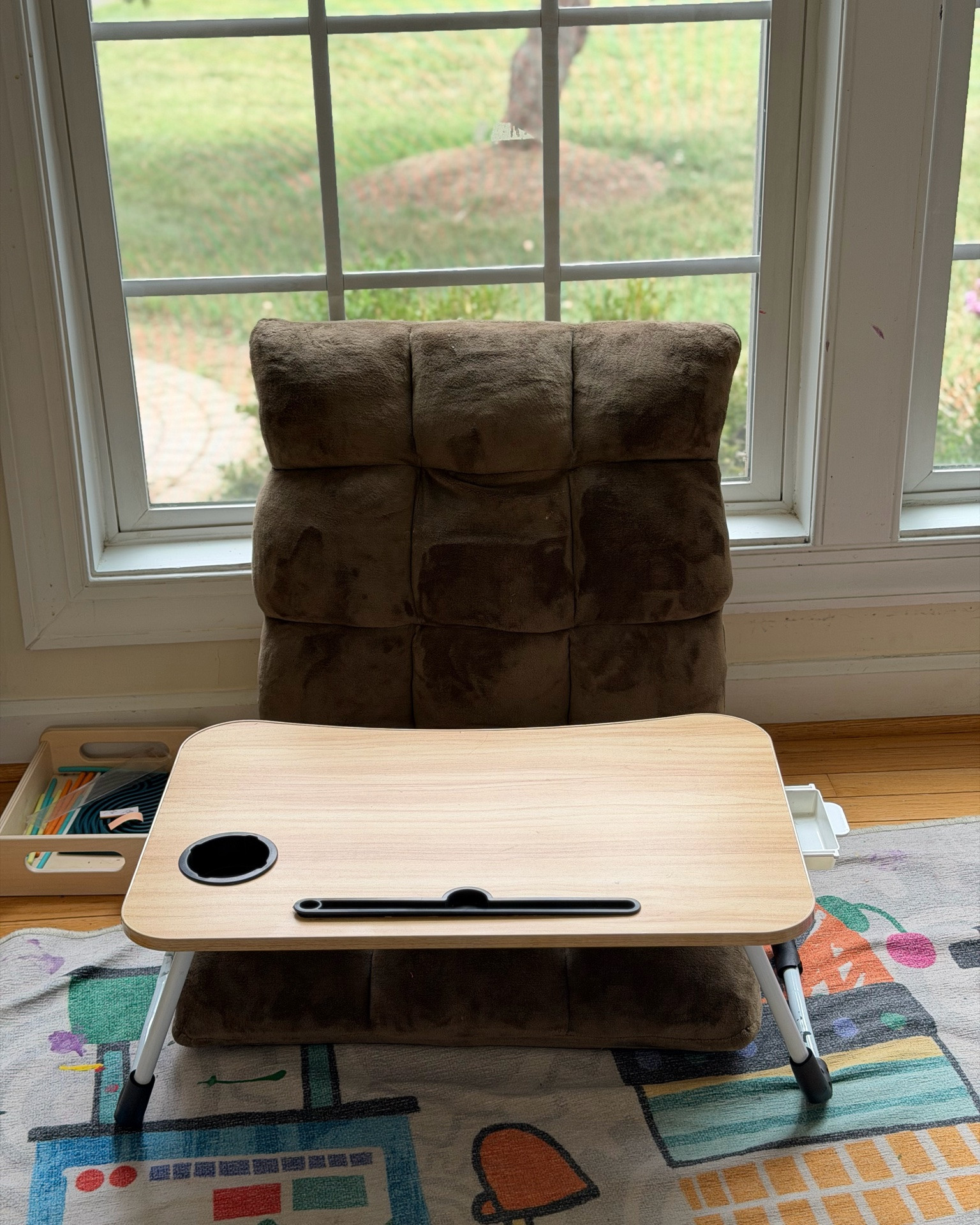 The floor desk setup we use for kids. It’s perfect for both my 1 and 5 year old
Adjustable memory foam floor chair 
Lap desk with storage

#LTKHome #LTKKids #LTKBaby