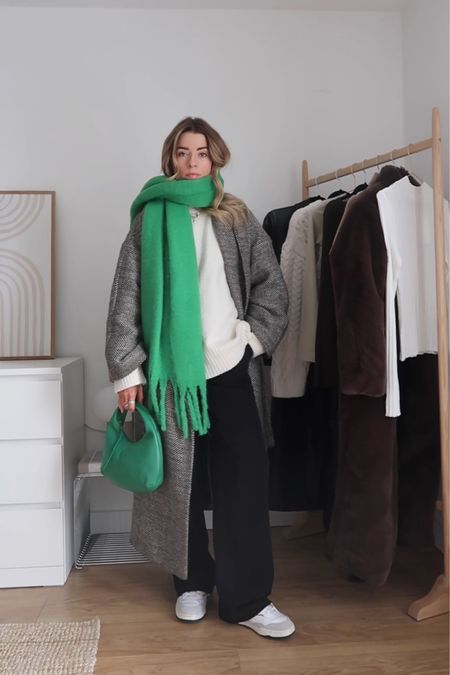 Black wide leg trousers styling - simple cream knit jumper teamed with a herringbone oversized coat, green scarf and green bag 



#LTKeurope #LTKstyletip