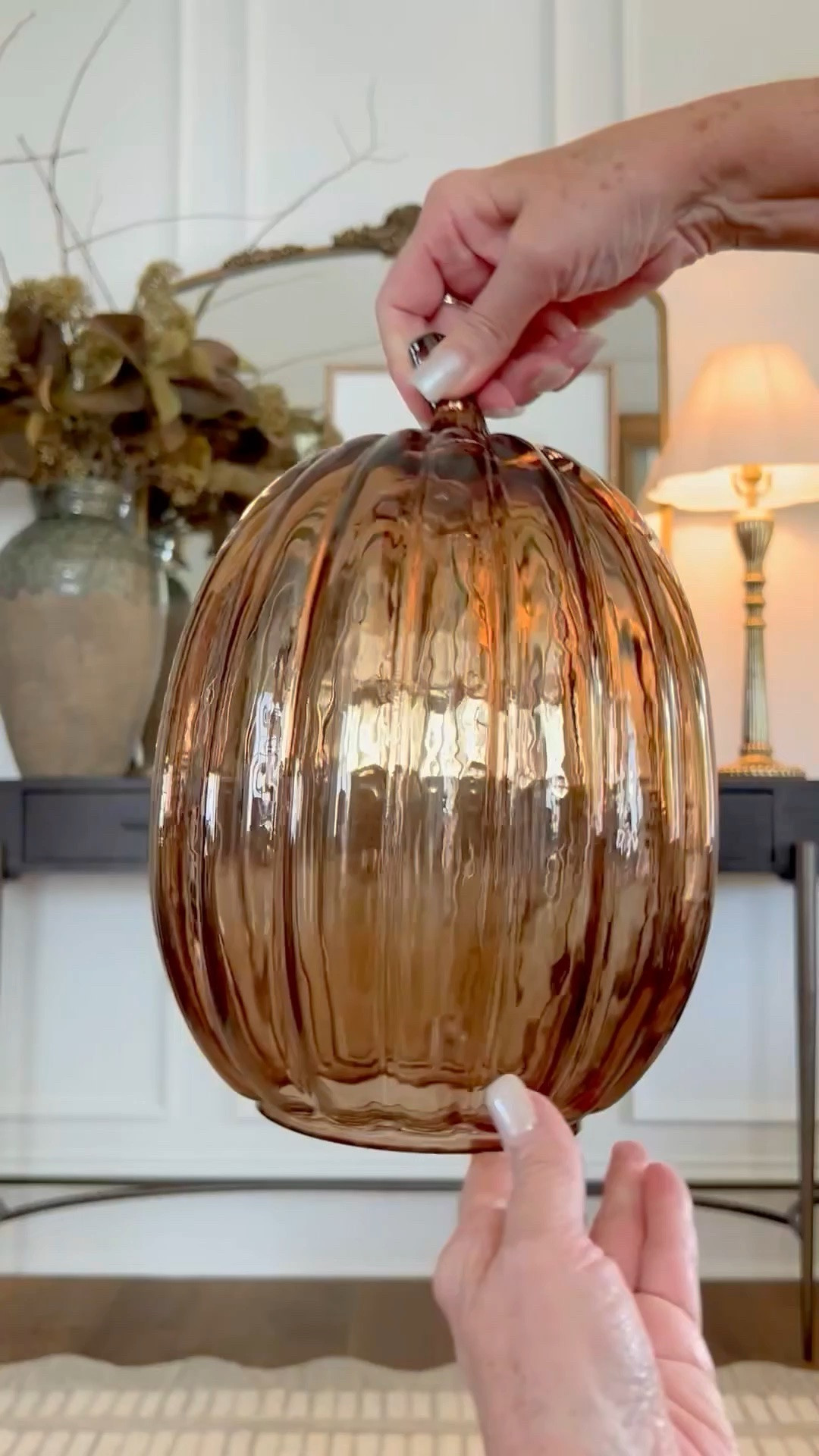 These pumpkin hurricanes are back from Target with additional shapes and sizes. Use LED candles or twinkle lights in them for a cozy, fall glow. 

 #LTKSeasonal #LTKHome #LTKSaleAlert