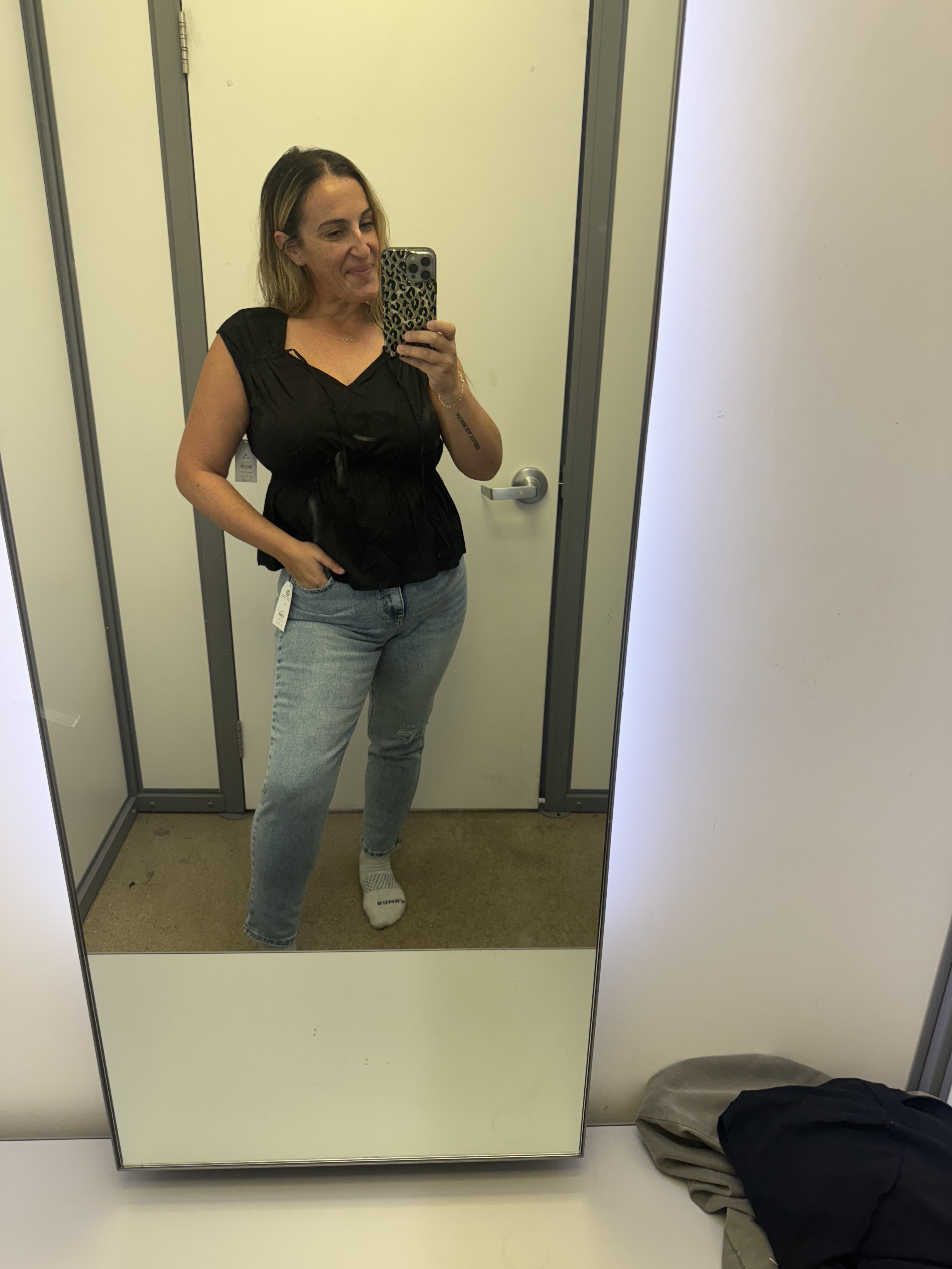 Blouse is comfortable with a stretchy seam. Im in a medium which is tts. The jeans run a bit big, Im in a 10 but an 8 would be better. Size down if in between. 

 #LTKOver40 #LTKFindsUnder50 #LTKStyleTip
