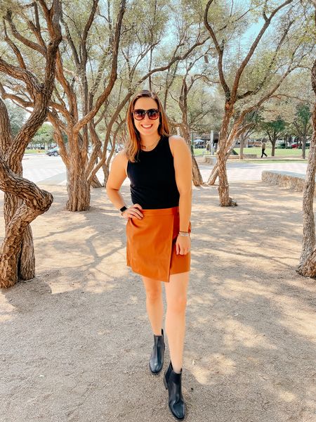 Feeling fall, but make it Texas 🍂😎 We’ve still got a few weeks ahead of very warm and toasty days, so I’m trying to pair my fall pieces with my leftover summer ones. I LOVE a good leather skirt with a tank now and a sweater for later. This one has great length so it can be worn basically anywhere (I always thought leather skirts were reserved for bars and GNO, but I wear mine all fall - seriously). I linked this look and a few other favorite leather skirts in the LTK app 🥰❤️

#LTKunder50 #LTKstyletip #LTKSeasonal
