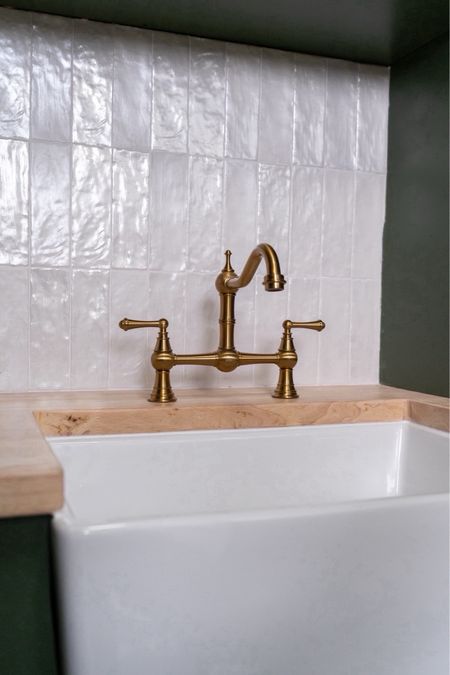 Grab this pretty and affordable brass faucet for your next bathroom renovation! Also, I love our farmhouse sink. 
#homedecor #whiteandgold #designtips #springrefresh

#LTKhome #LTKstyletip #LTKSeasonal