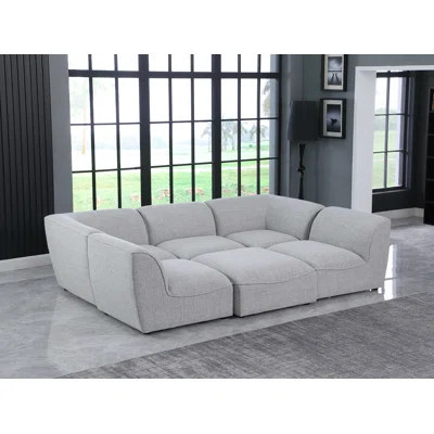 Calvie 109" Wide Reversible Modular Corner Sectional with Ottoman | Wayfair North America