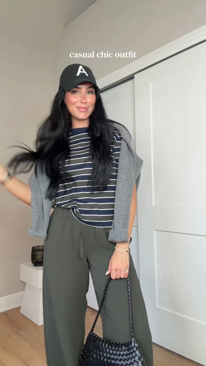Casual chic outfit 🍂🫒💙 The perfect mix of comfy + put together for fall! I’ll have all my outfit details linked on my LTK 🫶🏻

My sizing: 5’7”, 145 lbs, 32DD
Size small sweater & pants, size medium tee





#Aritzia #AritziaStyle #AritziaOutfits #FallOutfits #FallOutfitInspo Aritzia fall outfit, Aritzia outfit ideas, Aritzia fall 2026, Aritzia striped t-shirt, Aritzia striped tee outfit, Aritzia gray sweater, Aritzia green pants, Aritzia Lodge pants, casual chic fall outfit, casual fall outfit, comfy fall outfit, fall outfit inspo, fall fashion 2026, everyday fall outfit, elevated casual outfit, effortless fall style, neutral fall outfit, olive green pants outfit, striped shirt outfit, fall layering outfit, fall sneaker outfit, slip-on fall shoes, ASICS sneaker outfit, Target fall bag, Polène bag outfit, transitional fall outfit, September outfit ideas, chic mom outfit, off-duty fall style @Aritzia