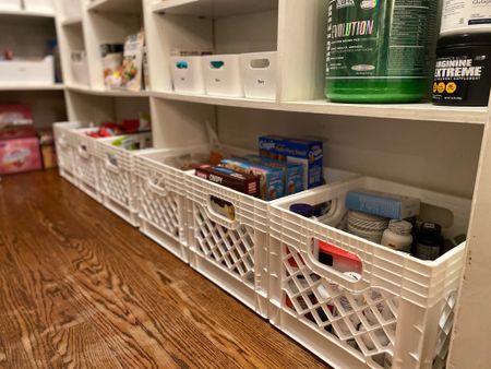 You don’t have to get crazy with pantry product. We love using white millk crates on the floor of the pantry - they are affordable, hold a ton and are multifunctional! 

#LTKunder50 #LTKfamily #LTKhome
