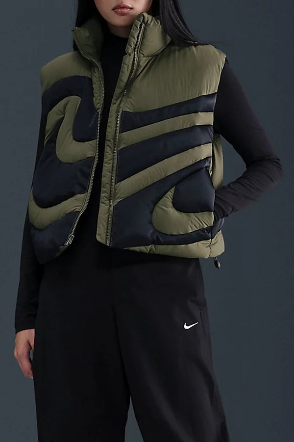 Nike Sportswear Swoosh Series Oversized Down Vest Jacket in Medium Olive/Black/Black, Women's at Urban Outfitters | Urban Outfitters (US and RoW)