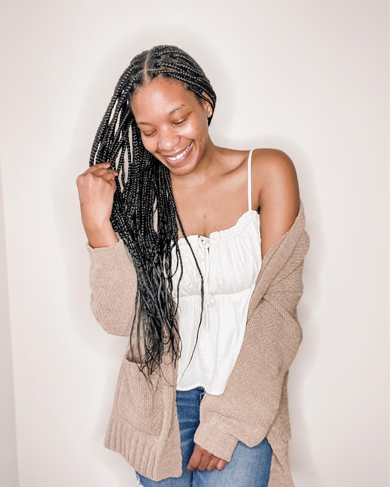 Oversized cozy weather cardigan and cream baby doll top. On sale!

#LTKHoliday #LTKsalealert #LTKGiftGuide