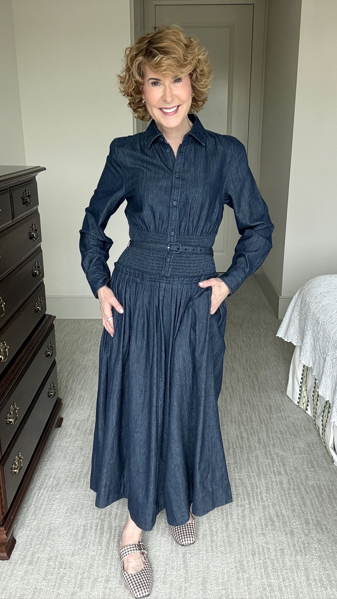 This Walmart dark wash denim midi dress is SO flattering! The smocked waist defines your shape beautifully, and it comes with a matching belt, although I think a brown belt would be darling too. I love the classic collared button-front style, long sleeves, pleated skirt, pockets, and longer ankle-grazing length. I paired it with brown gingham Mary Jane flats for a polished fall look.

#LTKootd #LTKOver40 #LTKSeasonal