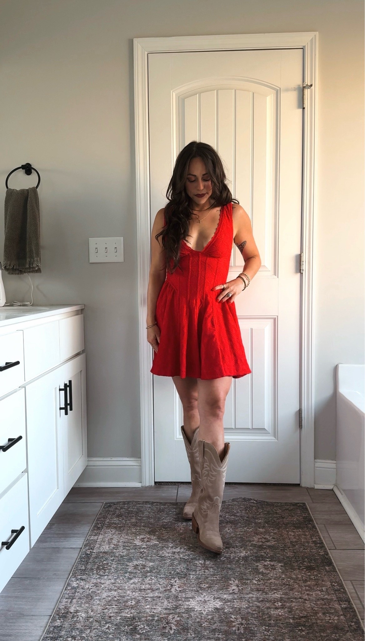 Wearing an XS in the dress and a 5.5 in the boots. Everything runs tts!