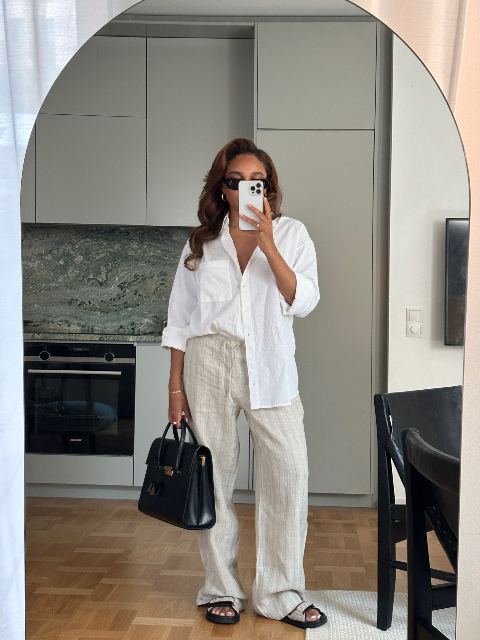 Summer outfit inspo, cream pinstripe pants, cream linen trousers, quilted sandals, cream double strap sandals, black handbag, white linen shirt, H&M, mango, Arket, Allsaints, mulberry 

#LTKeurope #LTKSeasonal #LTKfit