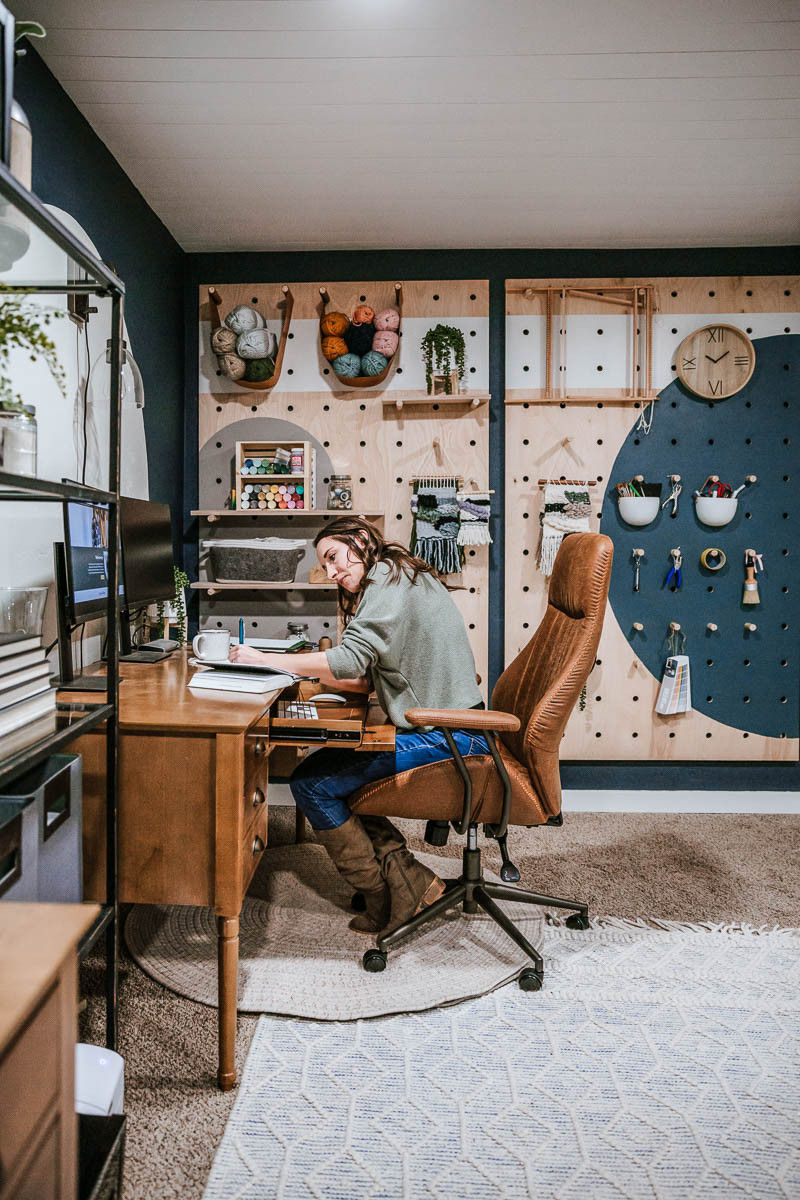 This cozy home office is such a great place to work! That pegboard provides serious storage for all the craft supplies! #homeoffice  

 #LTKHome