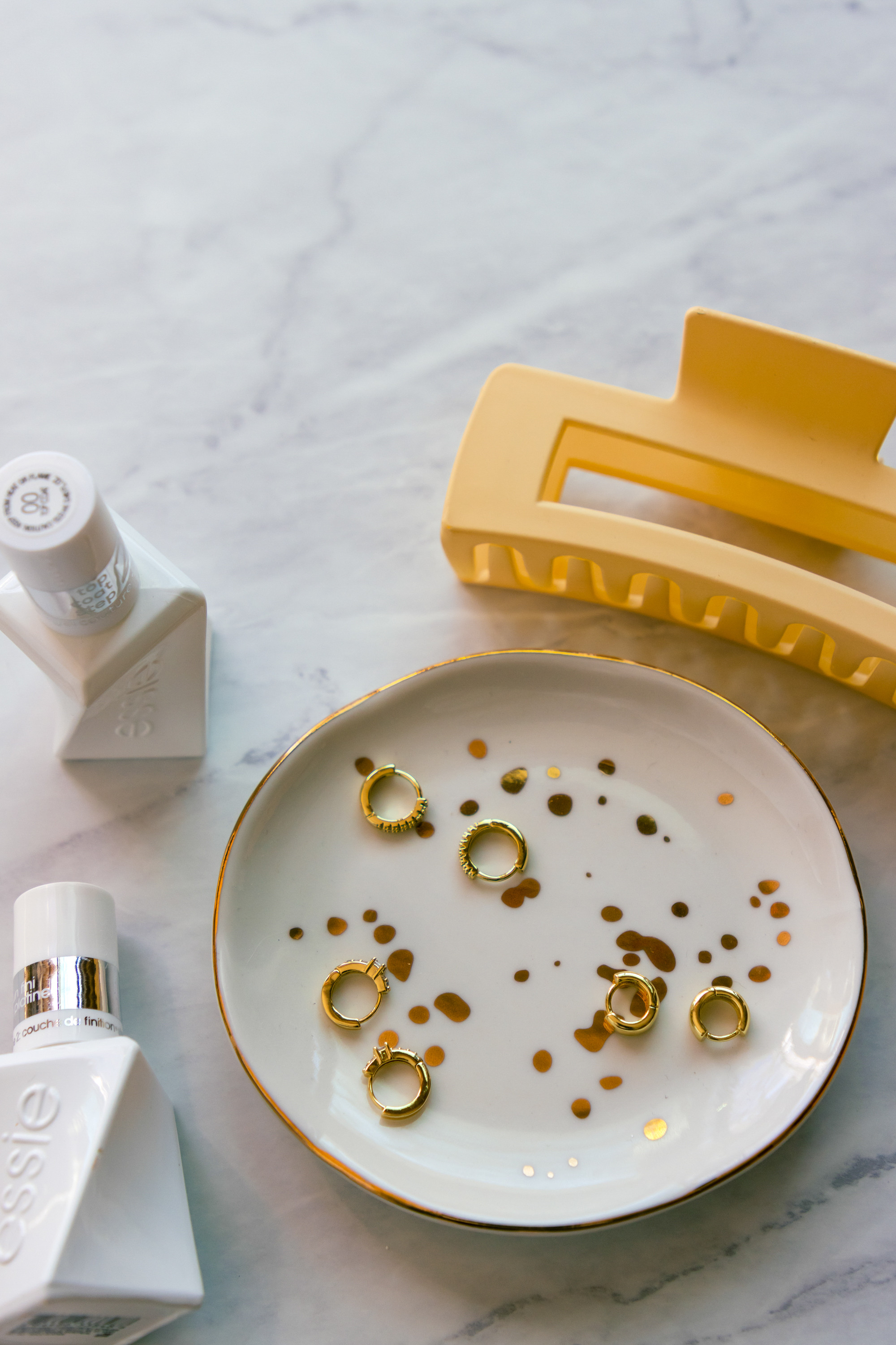 Found these adorable and affordable gold hoop earrings that are perfect for everyday wear or special occasions! Store them in the cutie ring dish to keep them organized. They'd make great gifts for yourself or friends!
 

 #LTKootd #LTKselfcare #LTKBeauty