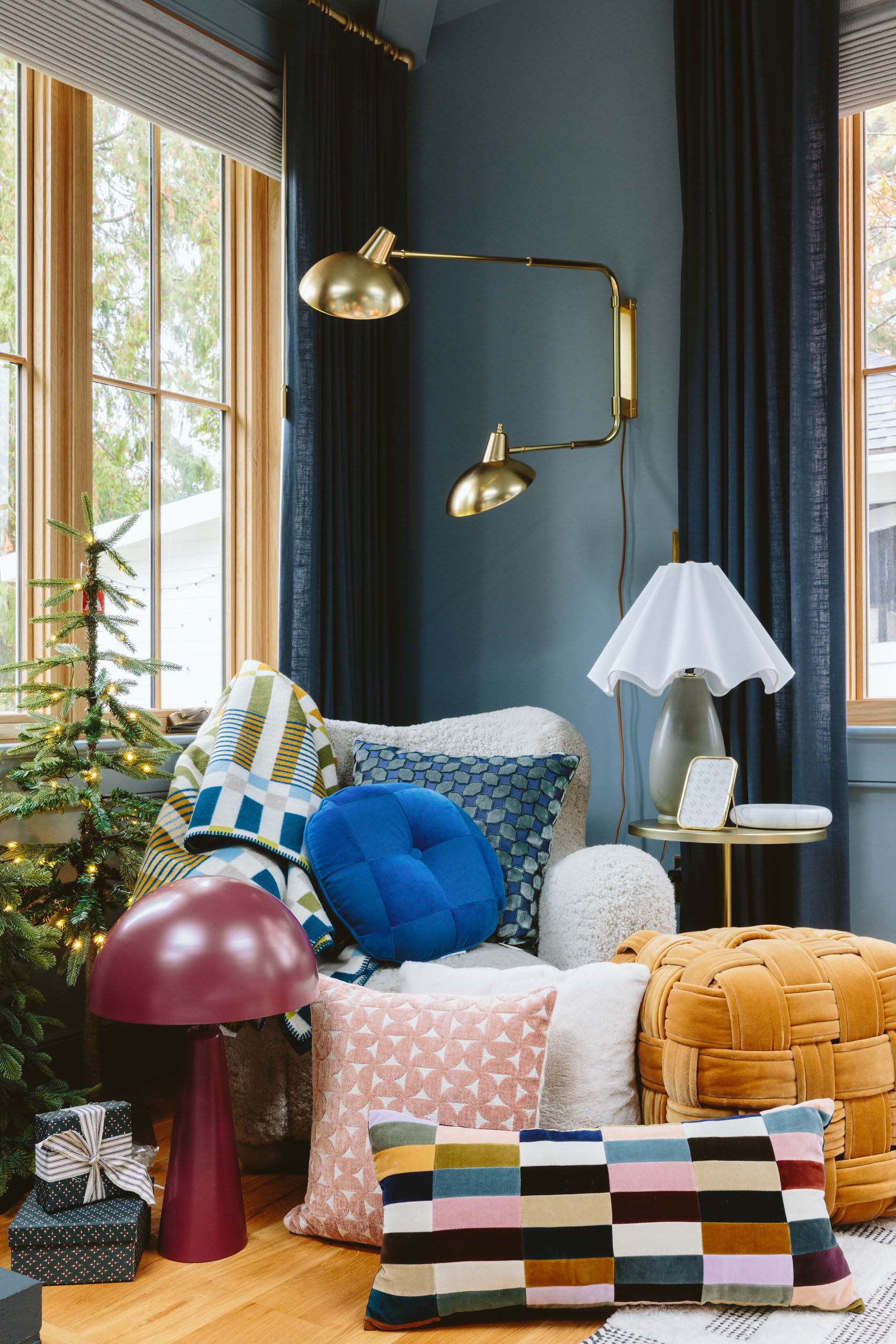 I don’t know what I love more – that incredible wavy lampshade on that green lamp – $70!!!!! FOR BOTH!!! Or that really good oxblood dome lamp (splurgier, but very powerful and makes a fast statement in any room). The mustard velvet ottoman is in my home and pairs so pretty with my blue velvet chair. But the Schoolhouse blanket? Certainly a splurge but it’s so incredible – if you have a basic bed or sofa and you want to punch up your room – a pattern like this does it INSTANTLY. And don’t forget that Rejuvenation has incredible velvet pillows in really rich colors (and some neutrals) for those of you who don’t want a pattern).

I’m really into velvet apparently, as almost all of these pillows are – it’s just such a pretty texture in really rich colors. The round blue pillow – special and such a punch. The blue/green velvet pillow is also excellent (and the same pattern comes as curtains which look so expensive and custom – patterned curtains are so back, y’all).

#LTKGiftGuide #LTKCyberWeek #LTKHome