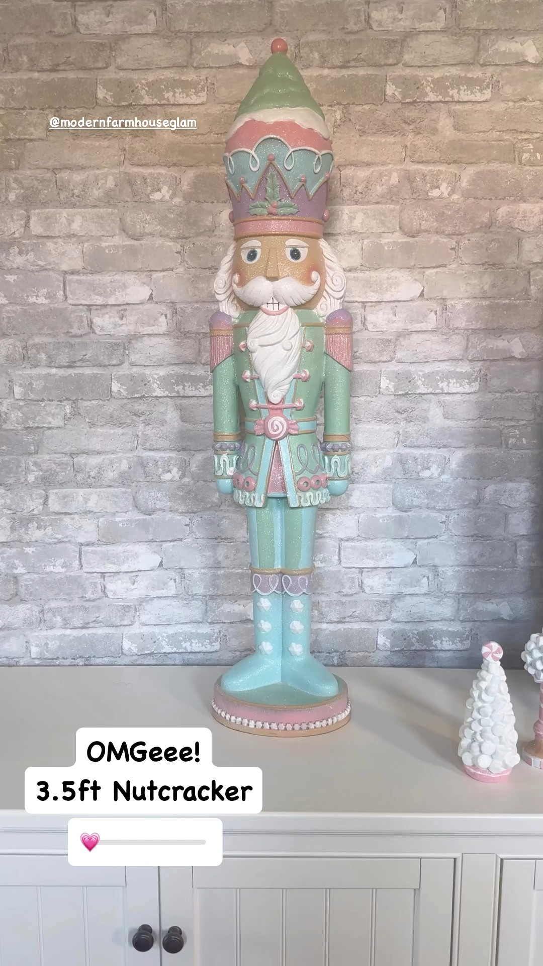 Pastel pink Christmas nutcracker. Peel and stick brick wallpaper. Console table white

#LTKHome #LTKSeasonal #LTKHoliday