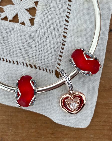 Beautiful Pandora Valentine’s Day gifts. Red Murano charms with silver hearts. Rose gold and silver hearts dangle. Mixing silver and rose gold is such a lovely combination  

#LTKSeasonal #LTKGiftGuide #LTKunder50
