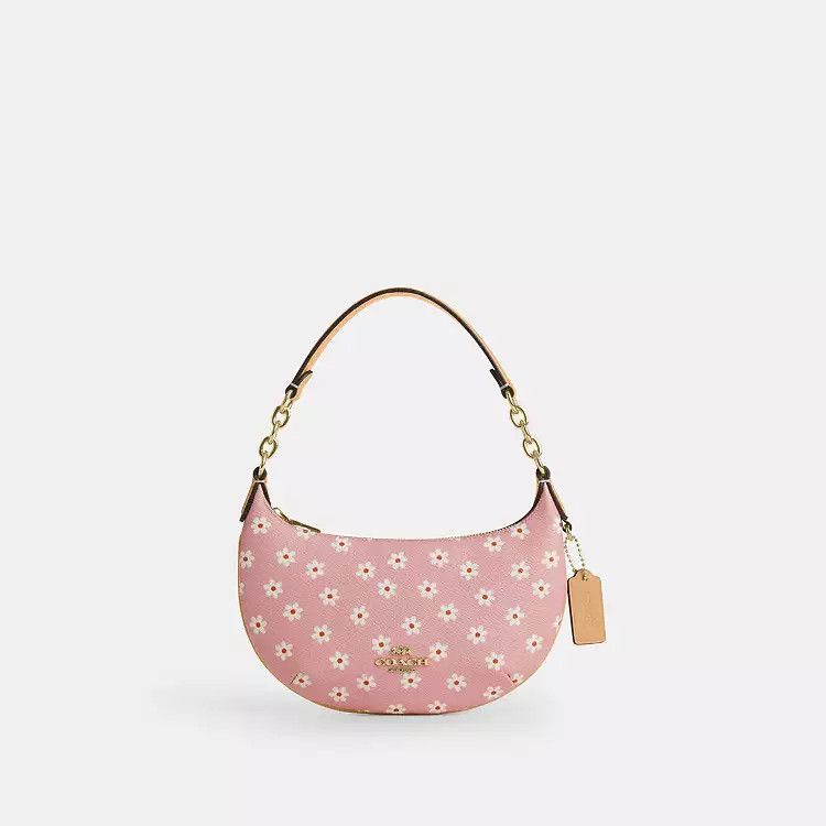 Mini Payton BagWith Floral PrintC$129(28% off)Comparable Value C$180Rating4.5(63) | Coach (CA)